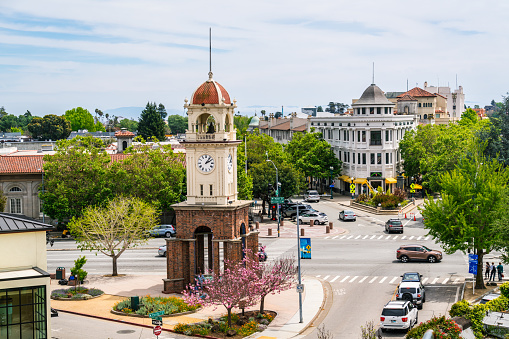 aerial view over entire city of Santa Cruz, California  clock tower in the middle of the square mid day sunshine on a nice day in california