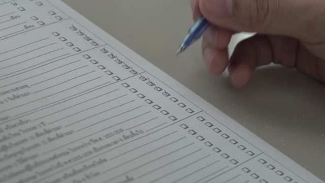 4k: Hand filling paper form