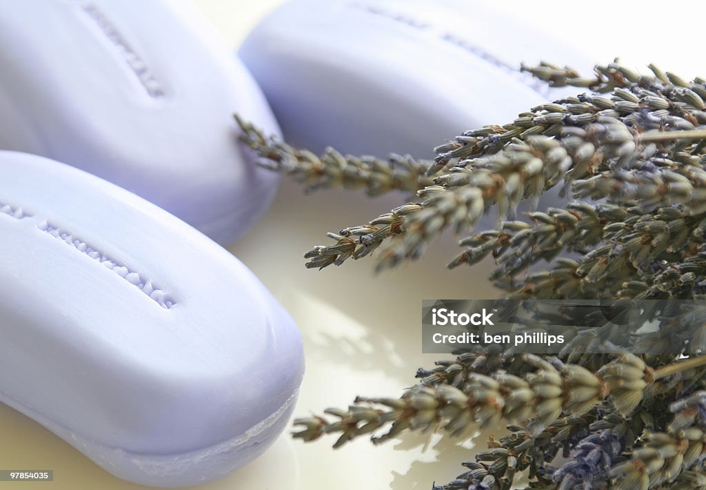 Lavender soap Bars of essential oil infused soap with sprigs of dried lavender. Aromatherapy Stock Photo