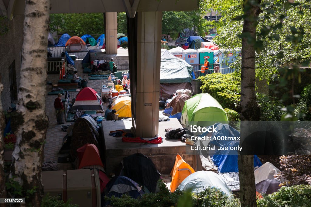 Seattle Seattle, USA - Jul 10, 2016: Row after row of tents to house the thousands of grwoing homeless in downtown late in the day. Homelessness Stock Photo