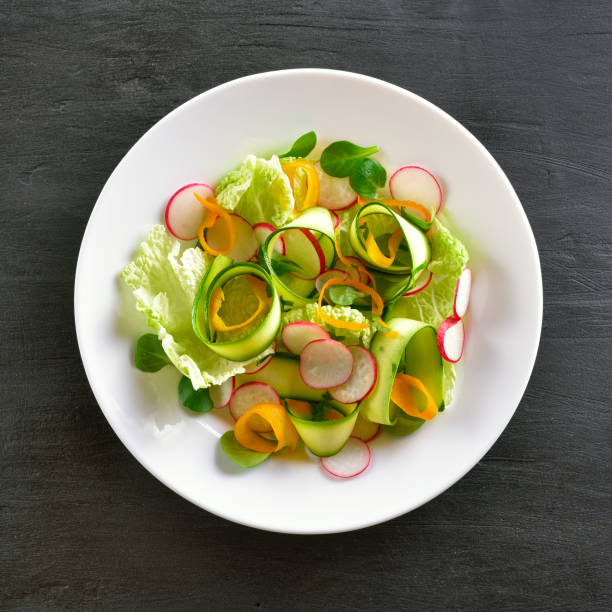 istock Vegetable salad with radish, zucchini, bell pepper 978548704