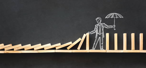 istock Domino Effect and Business Challenge Concept with Hand Drawn Chalk Illustrations on Blackboard 978555592