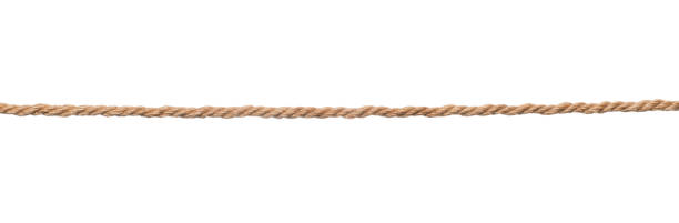 Brown rope isolated Long rough brown rope isolated on white string stock pictures, royalty-free photos & images