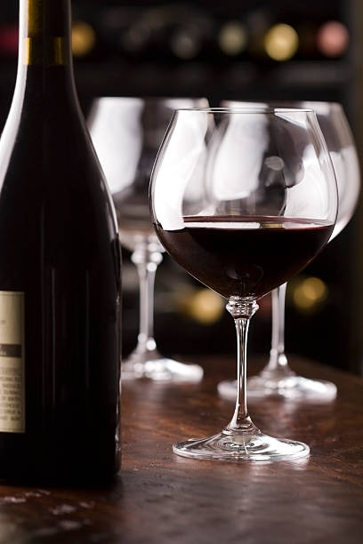 istock Wine tasting set up in front of rack 97856380