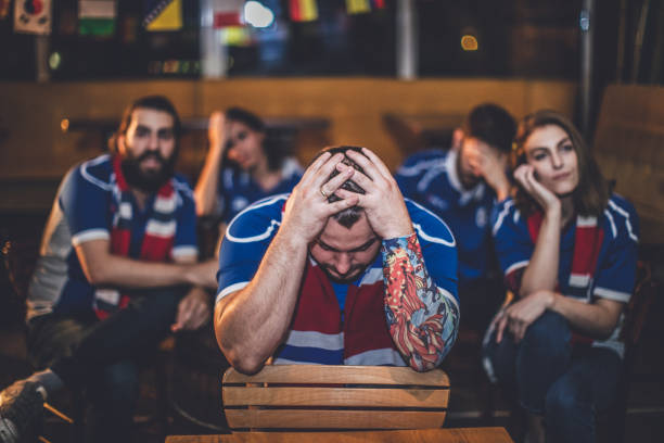 istock Disappointed sport fans 978575076