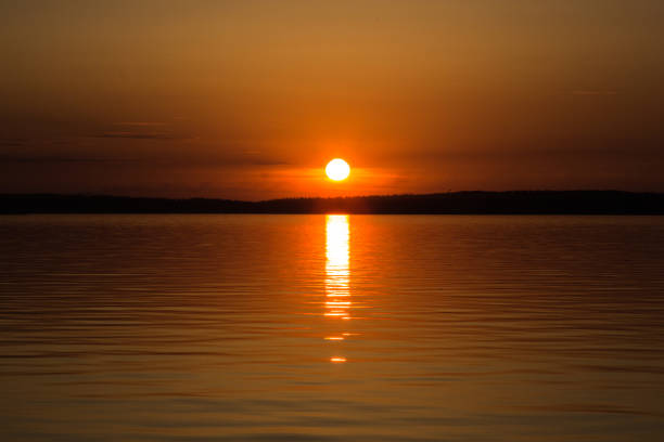 istock Colorful sunset or sunrise by the lake 978582546