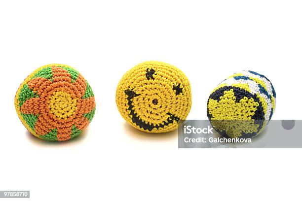 Tres Pequeñas Bolas Coloridas Fabricadas De Tejido De Seda Foto de stock y más banco de imágenes de Amarillo - Color
