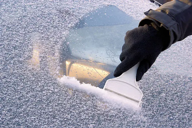 Photo of ice scraping