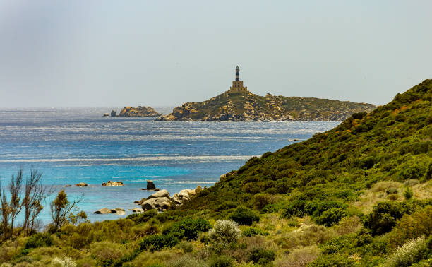 Capo Carbonara (Cagliari, Sardinia, Italy). View of the promontory of Capo Carbonara (Cagliari, Sardinia, Italy) in spring. headland stock pictures, royalty-free photos & images