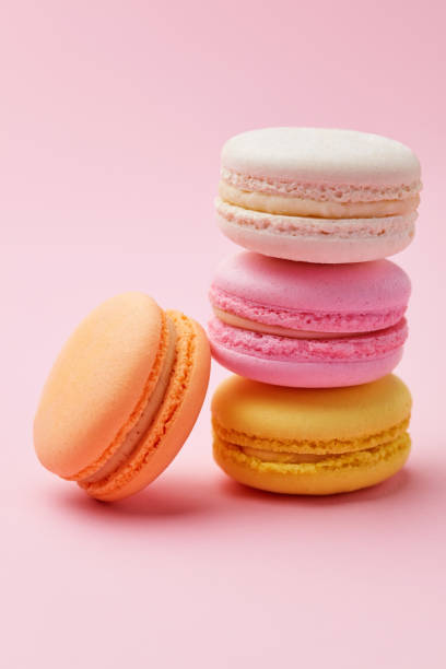 istock Macarons. Colorful Macaroons On Pink Background 978614434