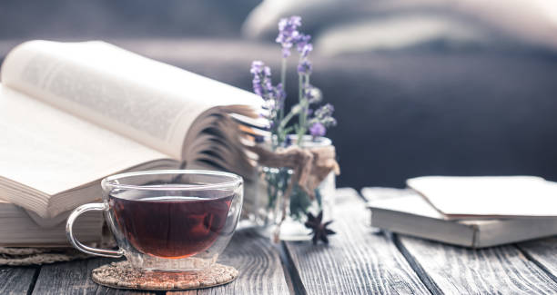 istock a cup of tea with a book in the interior 978615542