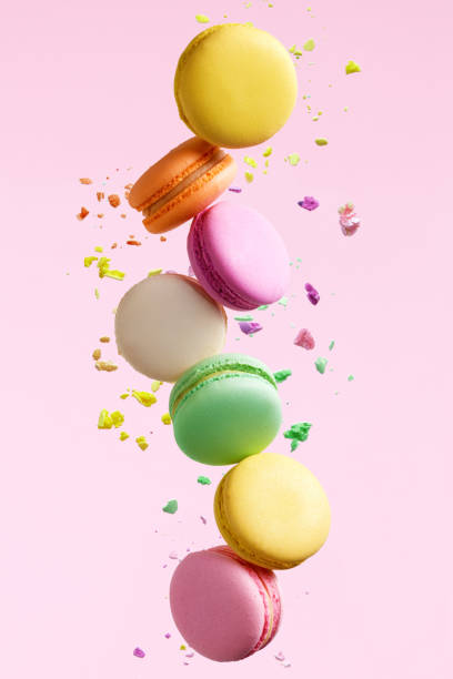 istock Macaron Dessert. Colorful Macaroons Flying 978615946