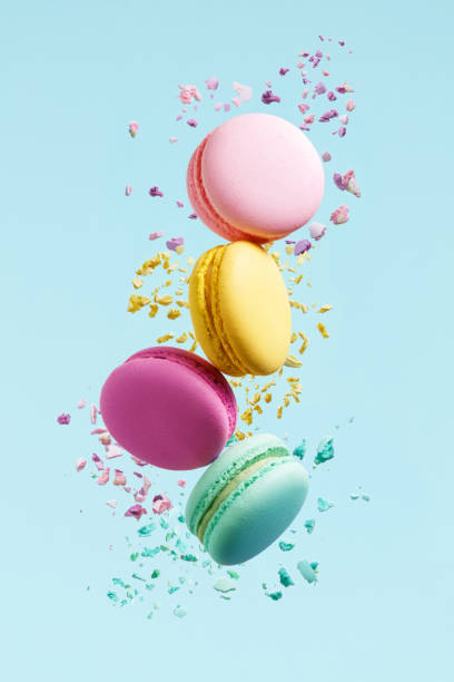 istock Macaron Dessert. Colorful Macaroons Flying 978618420