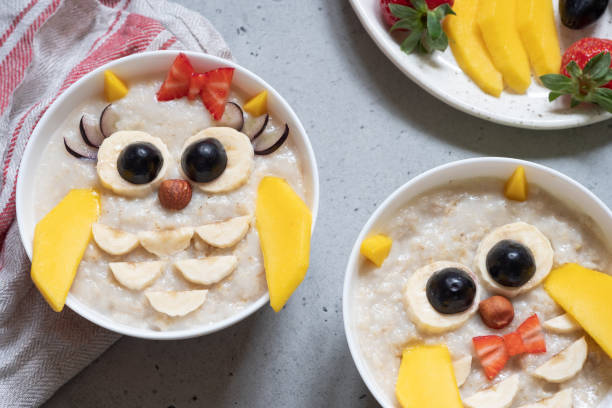 istock Kids breakfast porridge with fruits and nuts 978623336