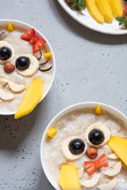 istock Kids breakfast porridge with fruits and nuts 978623404