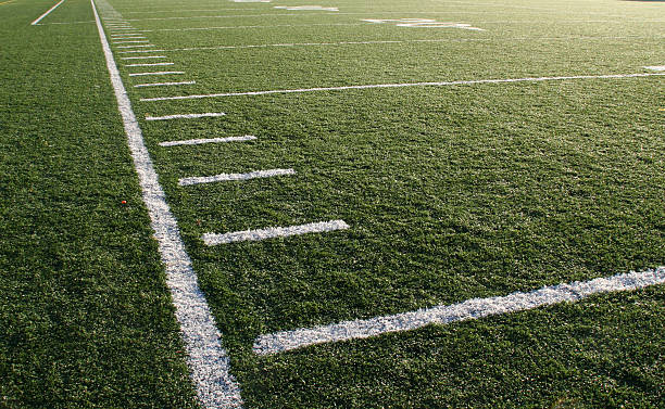 football - down the sideline running downhill american football field photos stock pictures, royalty-free photos & images
