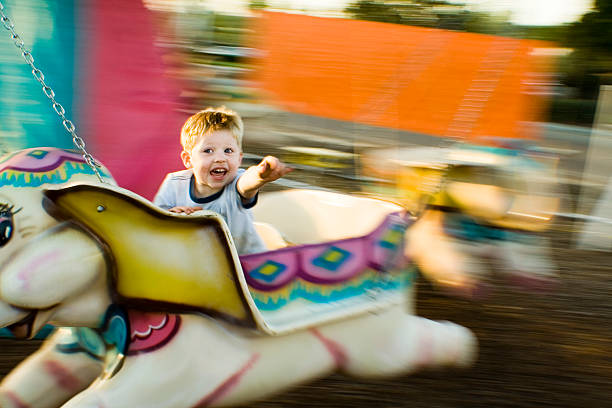 boy flys elephant stock photo