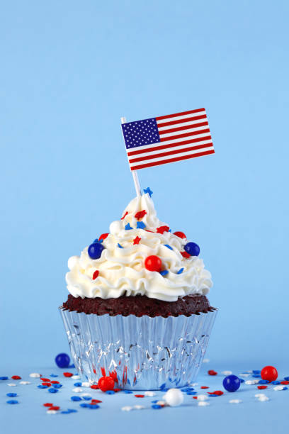 istock 4th of July cupcake with flag and sprinkles 978657936