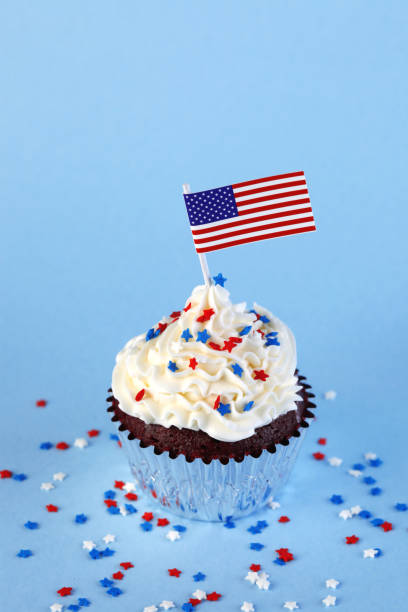istock 4th of July cupcake with flag and sprinkles 978658008