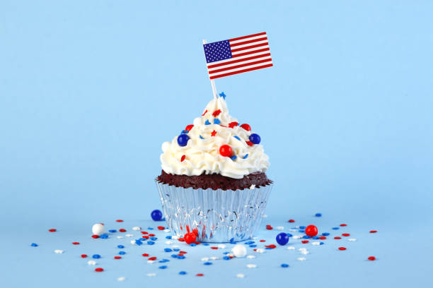 istock 4th of July cupcake with flag and sprinkles 978658066
