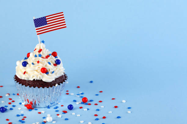 4th of July cupcake with flag and sprinkles