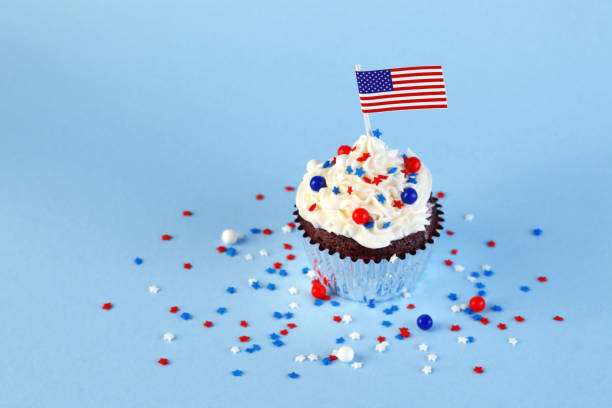 istock 4th of July cupcake with flag and sprinkles 978658208