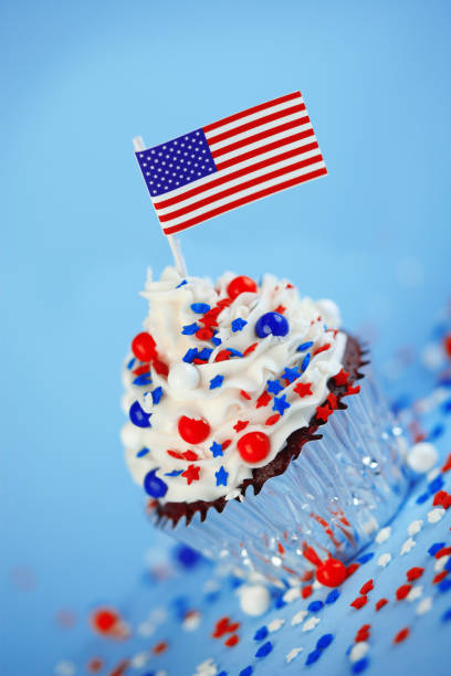 istock 4th of July cupcake with flag and sprinkles 978658360