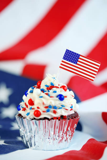 istock 4th of July cupcake with flag and sprinkles 978658570
