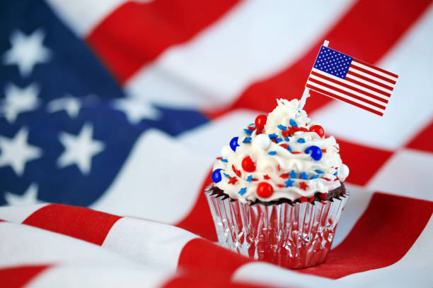 istock 4th of July cupcake with flag and sprinkles 978658704