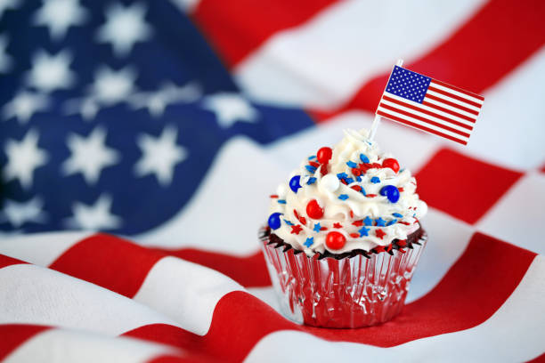 istock 4th of July cupcake with flag and sprinkles 978658768
