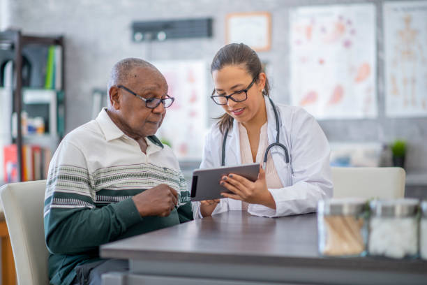 istock Senior at the doctor's office 978664400