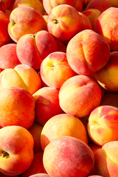 istock Fresh Peaches at an Outdoor Market 978710638