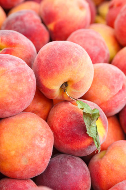 istock Fresh Peaches at an Outdoor Market 978710648