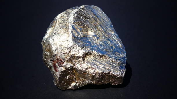 istock Metallic rock in close-up on a black background 978720814