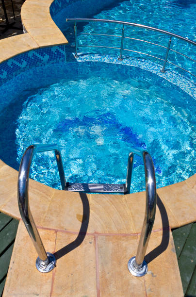 istock Beautiful swimming pool in hotel 978721970