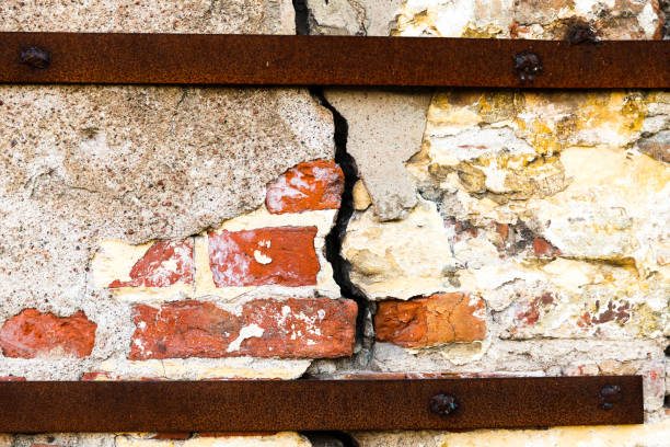 istock crack on the wall of a house 978724846