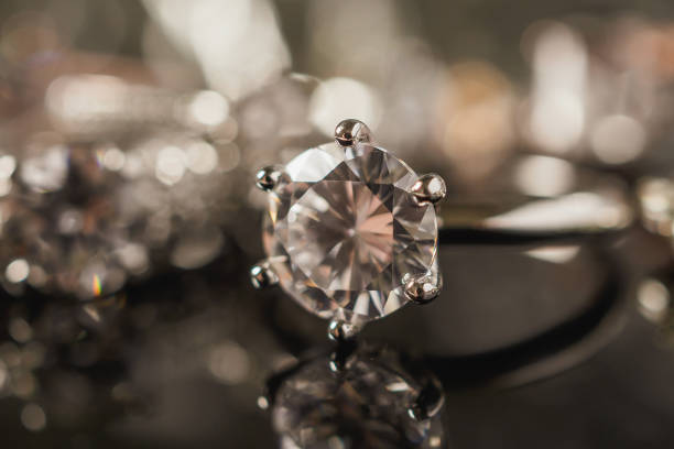 istock Luxury Jewelry diamond rings with reflection on black background 978725878