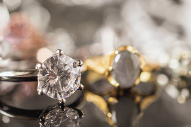 istock Luxury Jewelry diamond rings with reflection on black background 978725886