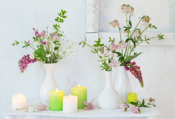 istock white vintage interior with flowers and candles 978730640