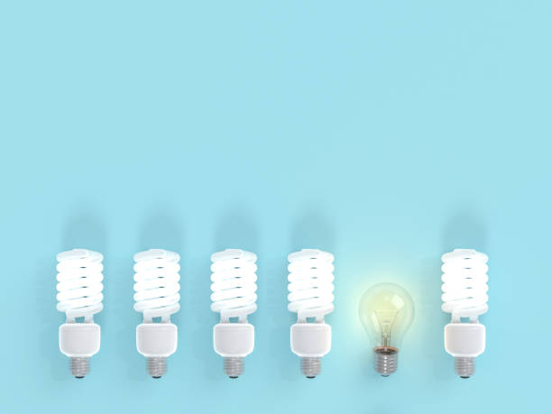istock Difference and creative concept. Light bulb among bulb on blue pastel color background 978749566