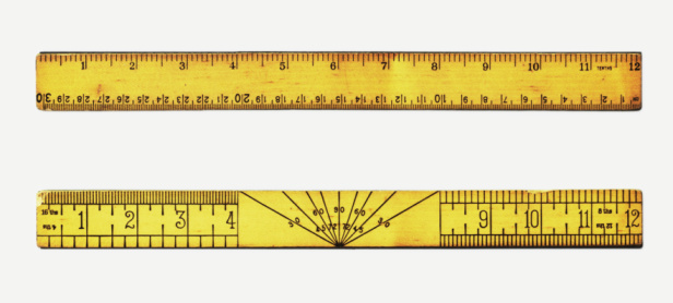 Sliding caliper with one euro coin.