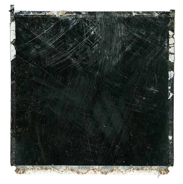 istock Grungy ruined scratched film frame 97875414