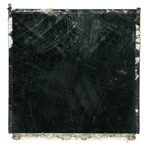 Grungy ruined scratched film frame A trashed Polaroid film frame with scratched surface texture. Insane amount of detail! Great for frames, borders, backgrounds and masks. instant camera photos stock pictures, royalty-free photos & images