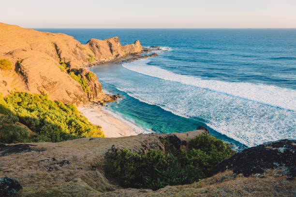 istock Tropical beach with ocean and rocky cape in island 978759006