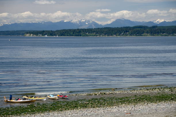 istock Kayaks on a break at Richmond  shore line, Saltwater park 978760124