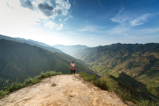 Hang Dong commune, Bac Yen district, Son La Province, Vietnam - May 20, 2018: Hiking tourists explore the trail on spine and the top of the mountains Hang Dong. This is a very popular tourist destination in Son La province, Vietnam