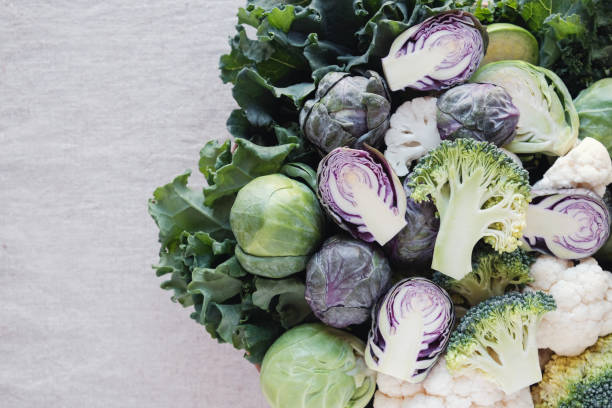 istock cruciferous vegetables, cauliflower,broccoli, Brussels sprouts, kale in wooden bowl, reducing estrogen dominance, ketogenic diet 978767544