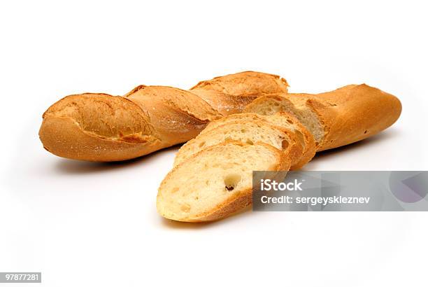 Fresh Baguette Sliced Isolated On White Background Stock Photo - Download Image Now