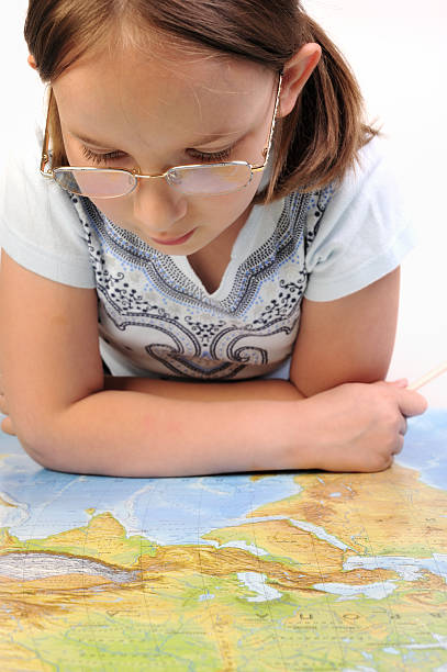 istock Girl exploring the map of Eurasia 97877804