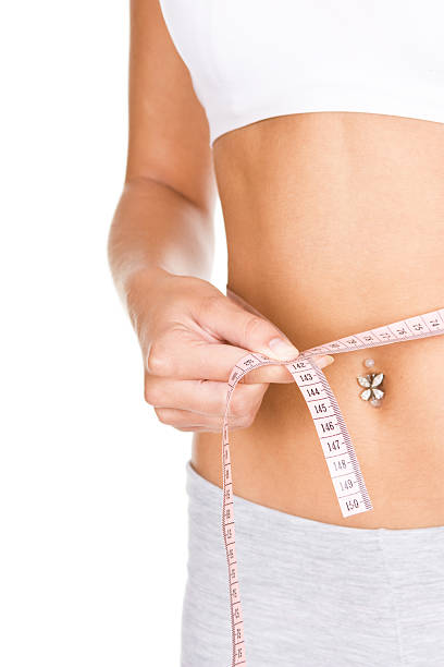 istock woman with measure 97878229